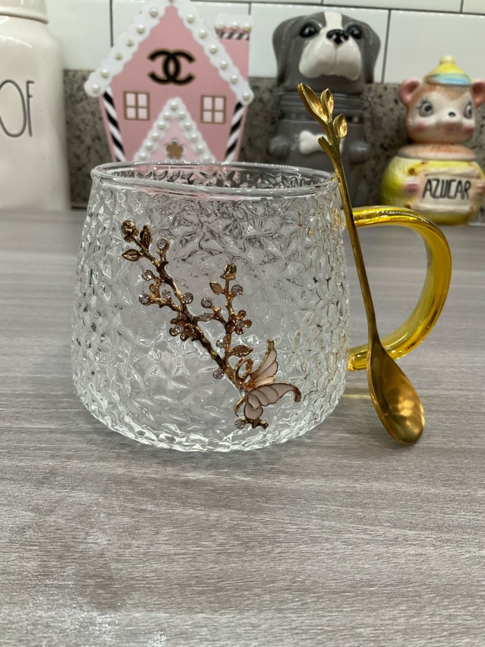 HAMMERED GLASSWARE WITH BUTTERFLY AND FLORAL DETAIL AND GOLD‎ TONE SPOON